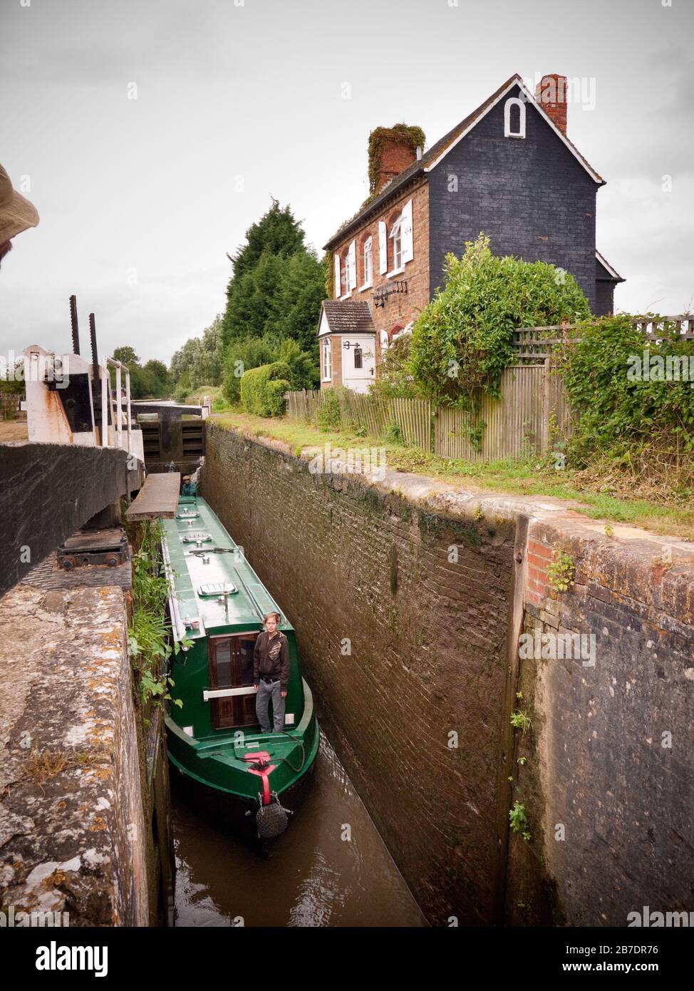 Hire boat descending Somerton Deep Lock near Banbury on the Oxford Canal (South),  England, UK, Britain Stock Photo