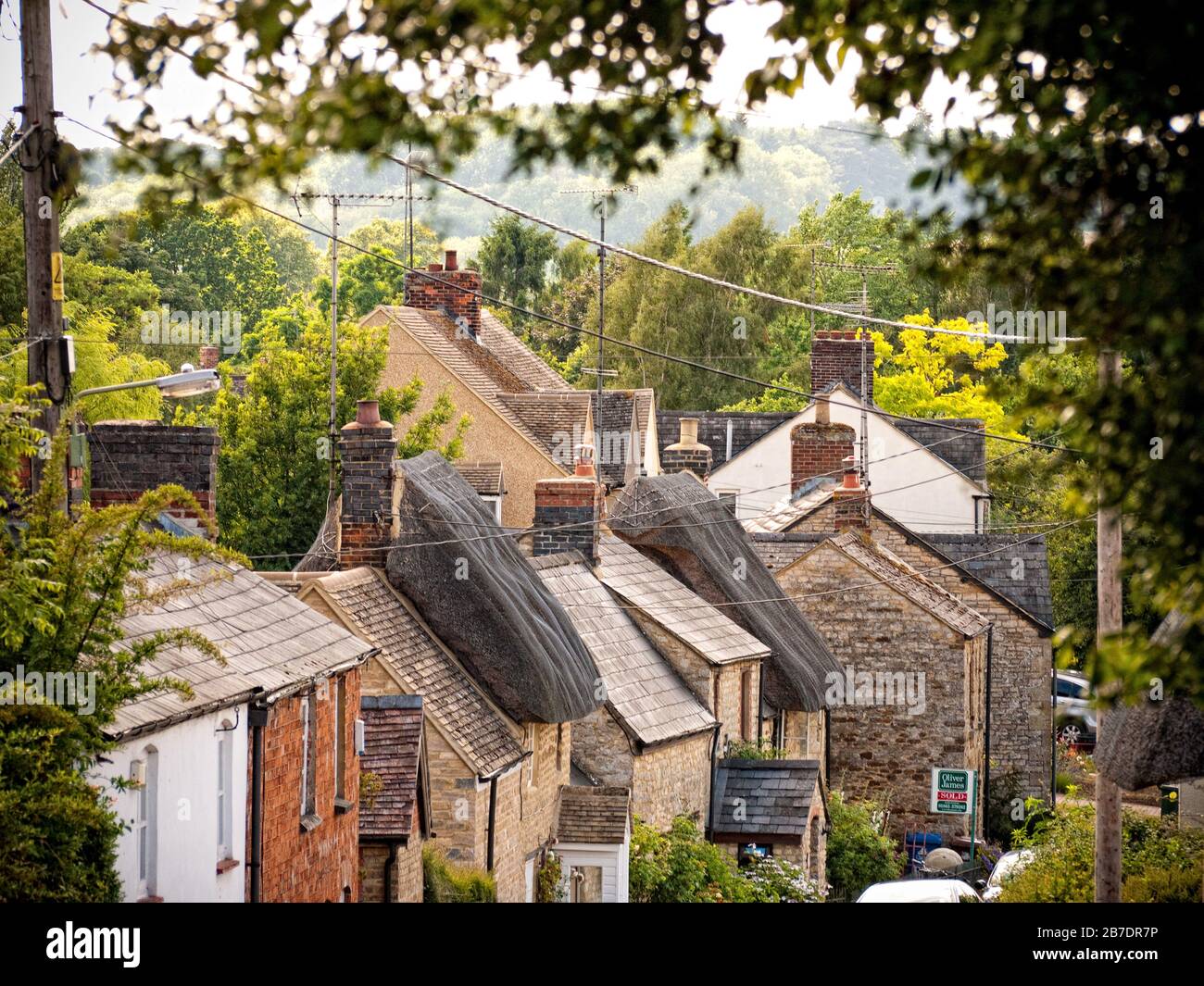 Thatched Rooves and house frontages of cottages in Oxfordshire, Lower Heyford,  England, UK, Britain Stock Photo