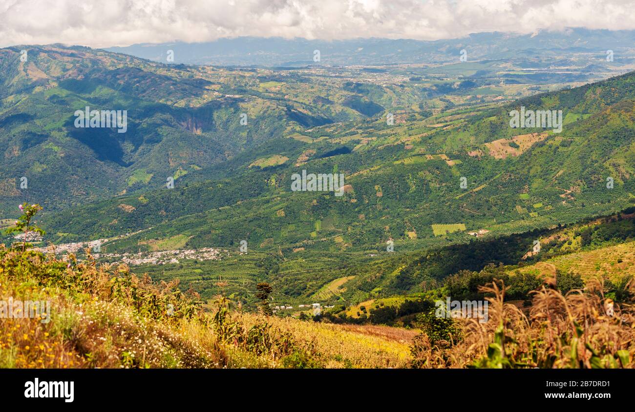 Hillside farming in Guatemala on steep ridges in patchwork shapes Stock Photo