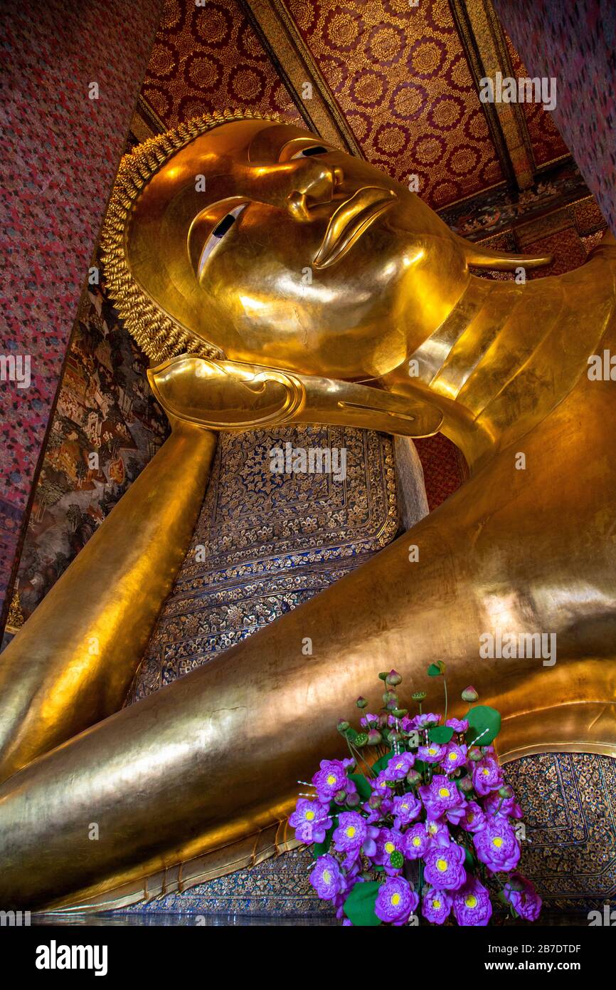 Reclining Buddha statue in the Buddhist Temple known as Wat Pho, in Bangkok, Thailand Stock Photo