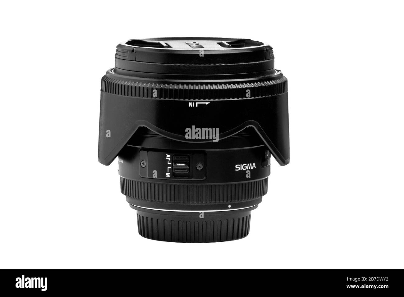 image of a sigma lens with a lens hood for the camera on a white background Stock Photo