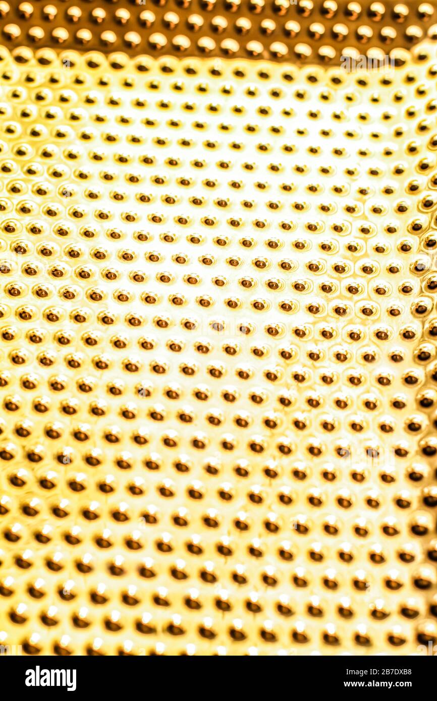 Texture of golden metallic surface as background, materials and ...