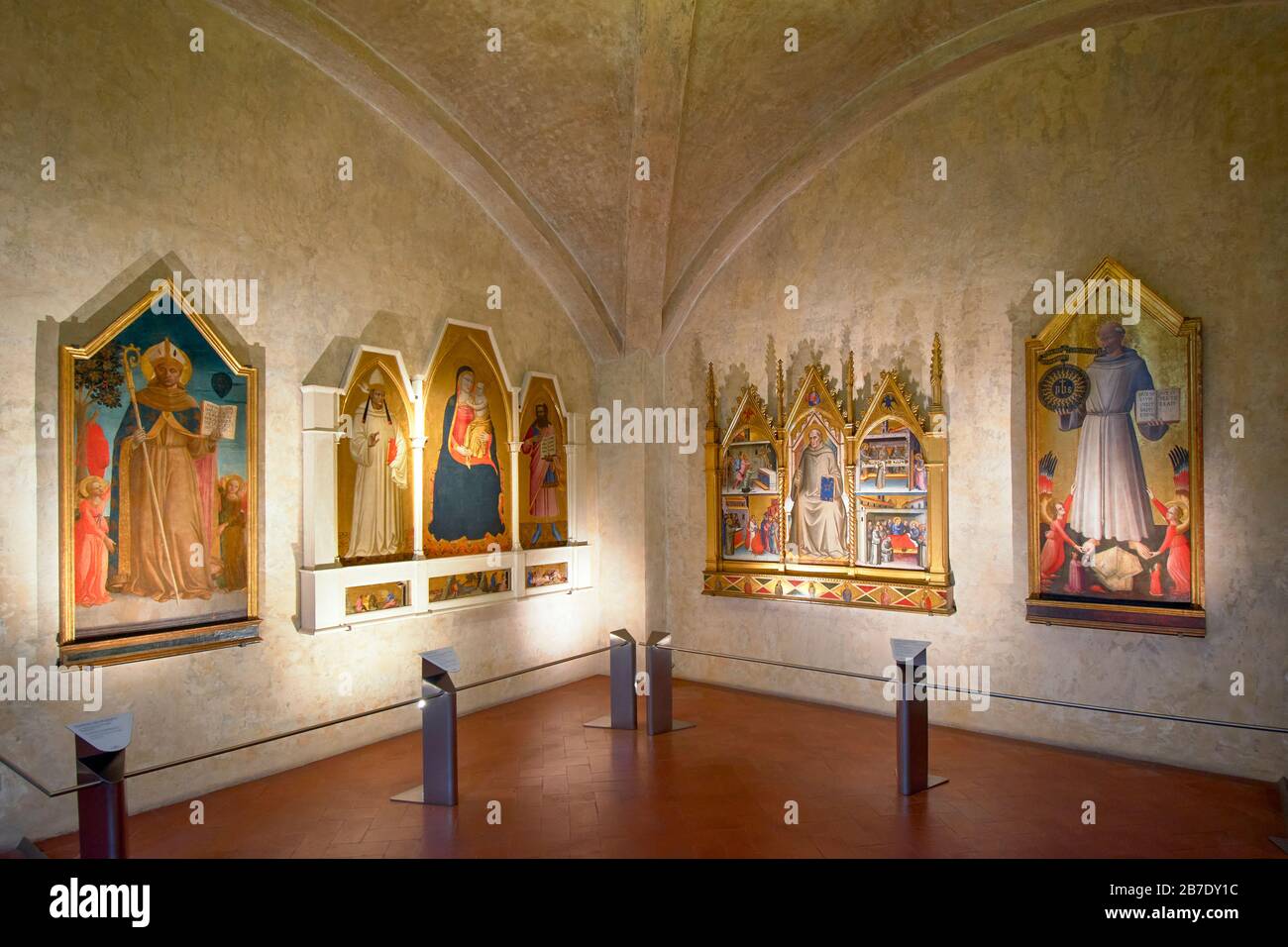 FLORENCE ITALY SANTA CROCE MUSEUM TRIPTYCH AND PAINTINGS DISPLAYED ON THE WALLS Stock Photo