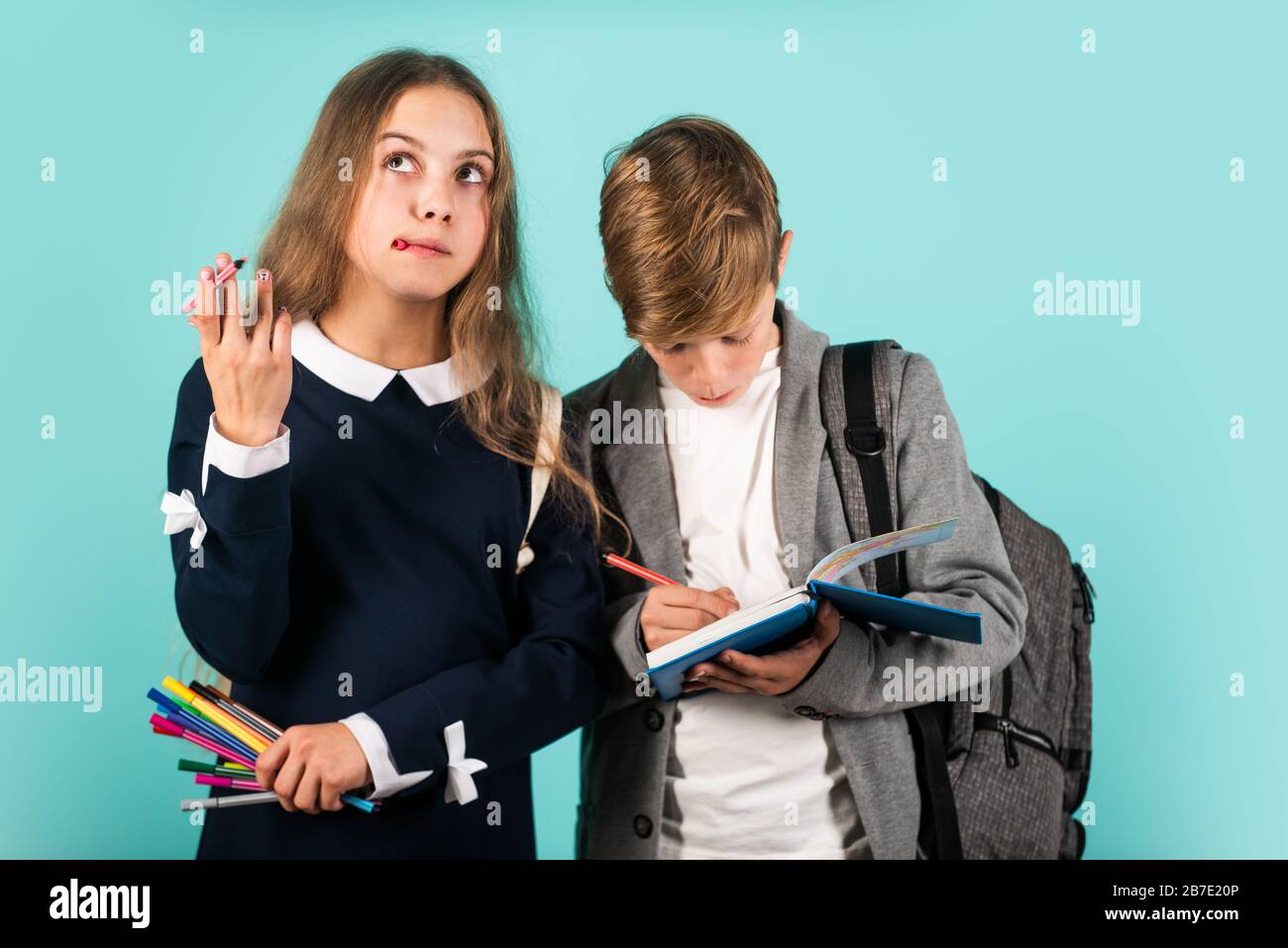 Study together. Student ready for lessons. Regular school program. School education for advanced level. Easy learning concept. International students exchange. School knowledge. Talent development. Stock Photo