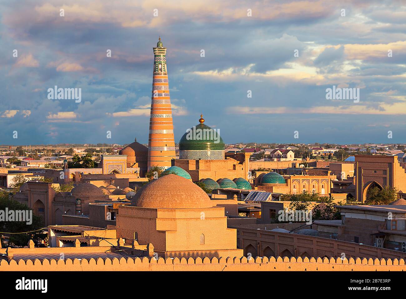 View over the skyline of the ancient city of Khiva at the sunset, Uzbekistan Stock Photo