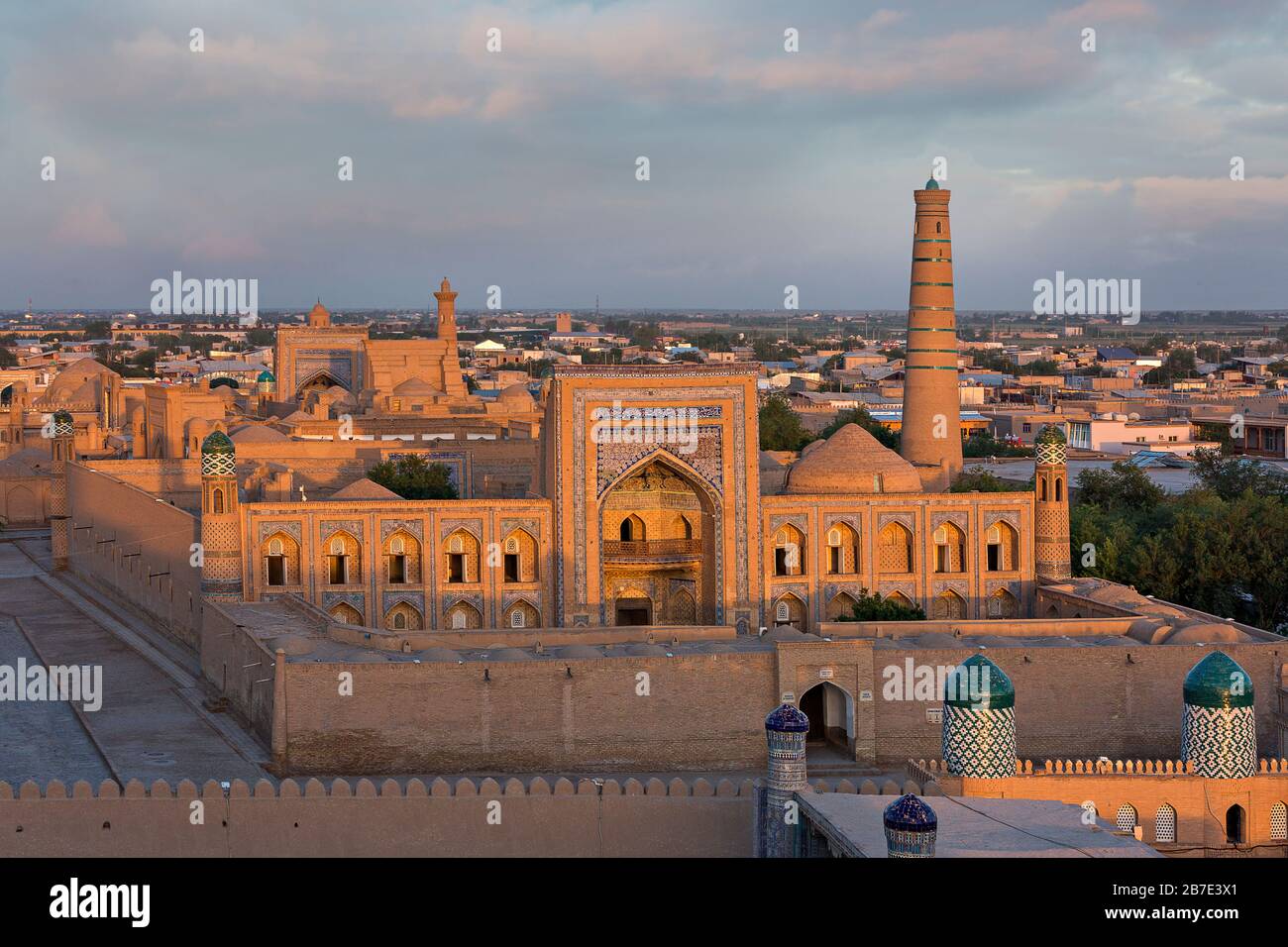 View over the skyline of the ancient city of Khiva at the sunset, Uzbekistan Stock Photo