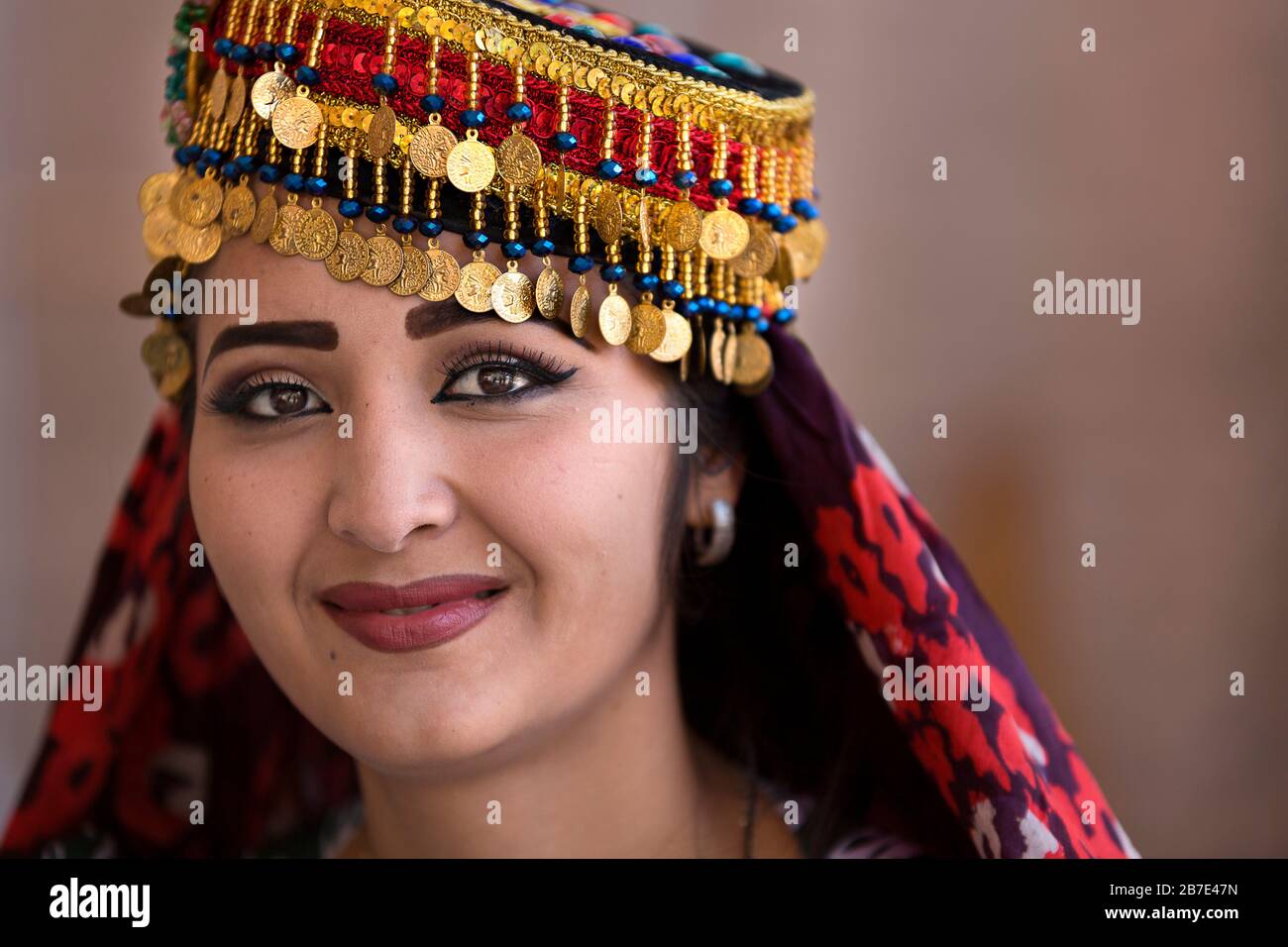 Uzbek woman with local hat, in Khiva, Uzbekistan Stock Photo