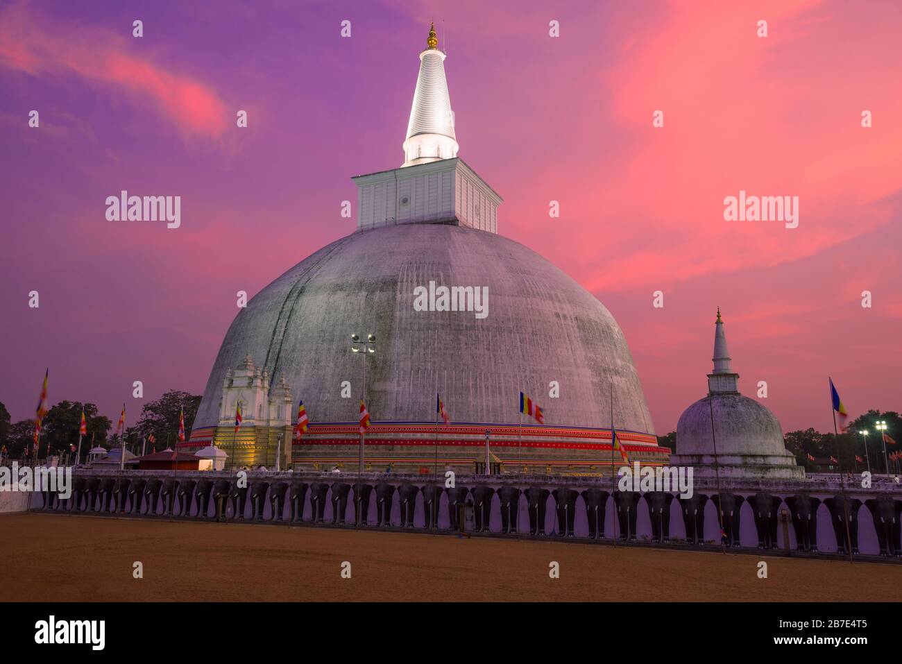 Ruwanweli Maha Seya Dagoba  close-up on a sunset background. Anuradhapura, Sri Lanka Stock Photo