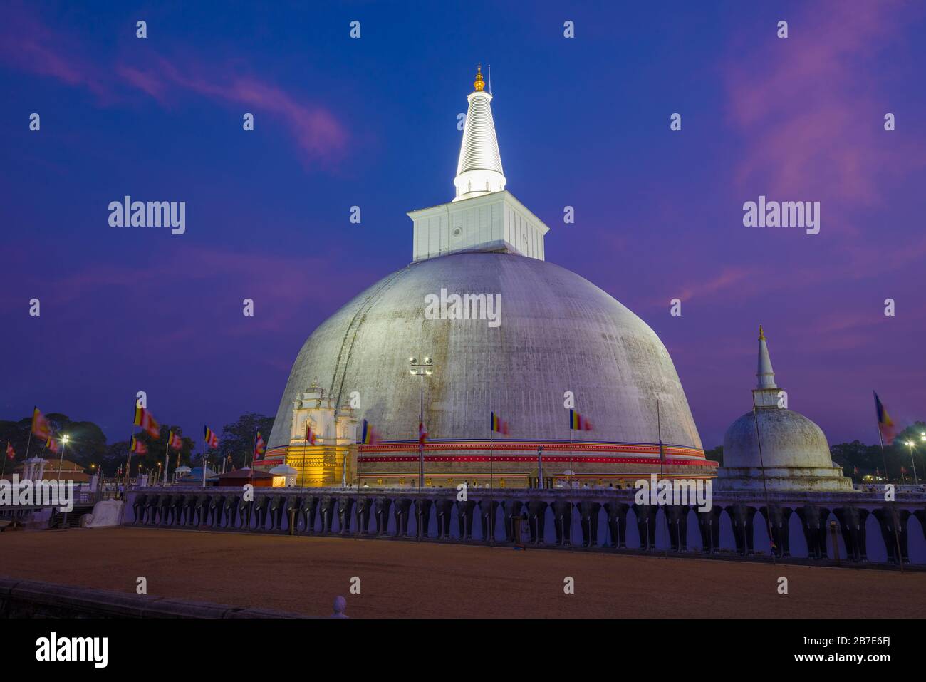 The ancient Ruwanweli Maha Seya Dagoba on evening twilight. Anuradhapura, Sri Lanka Stock Photo