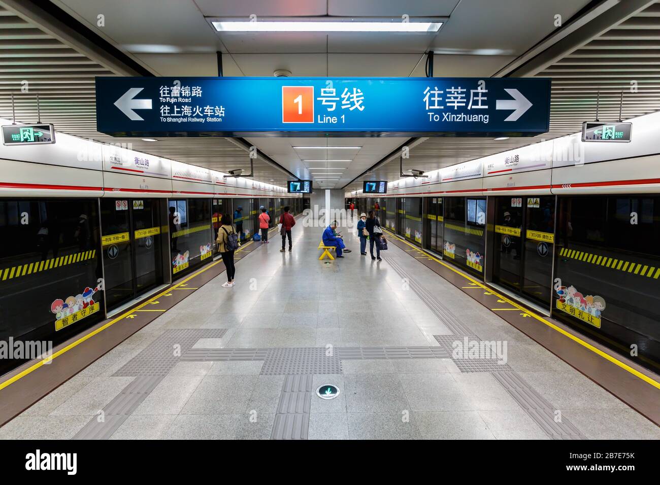 Interior view at the platform of Hengshan Road metro station. A sign is