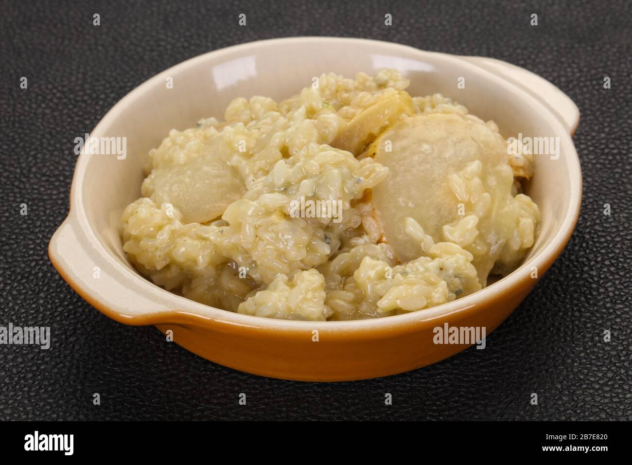 Risotto with pear and cheese Stock Photo Alamy