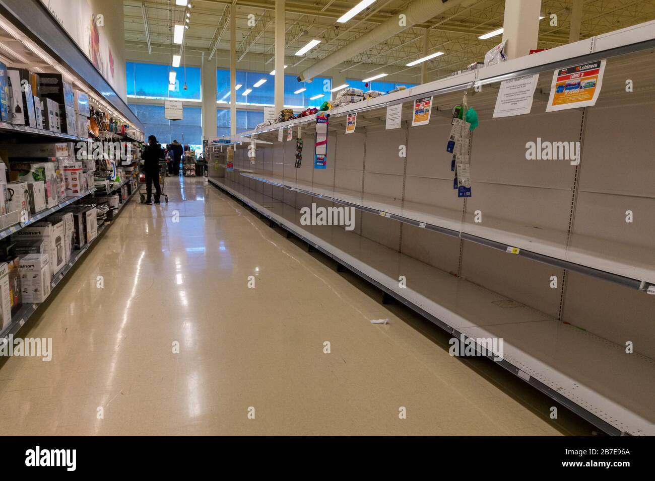 Toronto, Canada. 15th March 2020. Near emptied shelves at a Loblaws grocery store in Toronto's