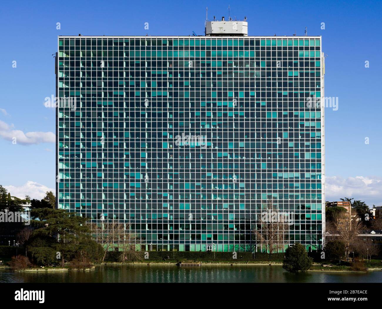 ENI, oil and gas italian company headquarters modern building facade. Glass Palace. EUR district, Rome, Italy, Europe, EU Stock Photo