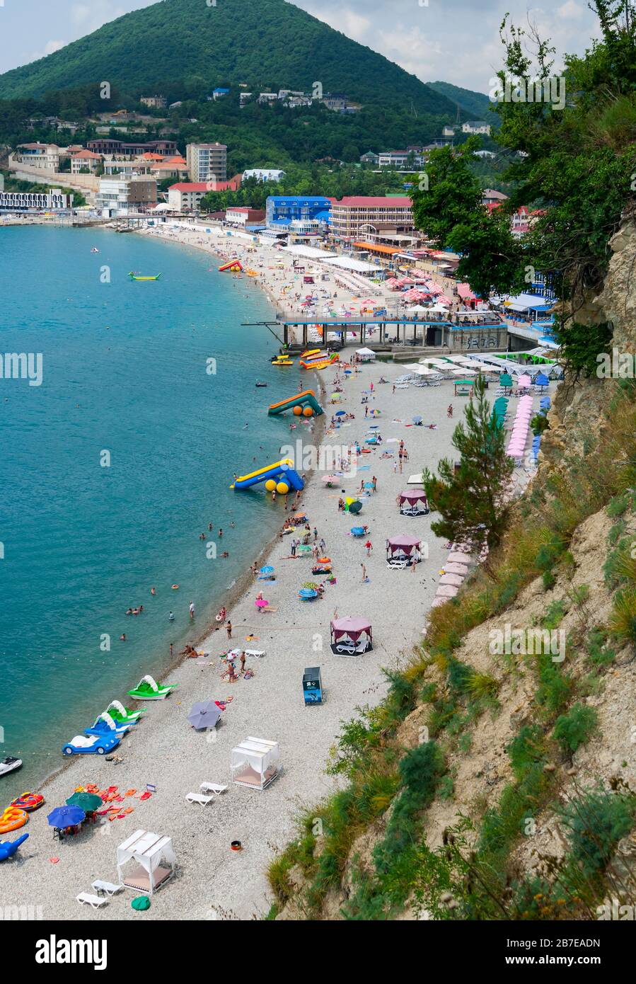Crowds of bathers on the beach at Black Sea. Olginka. Krasnodar Krai, Russia. Stock Photo