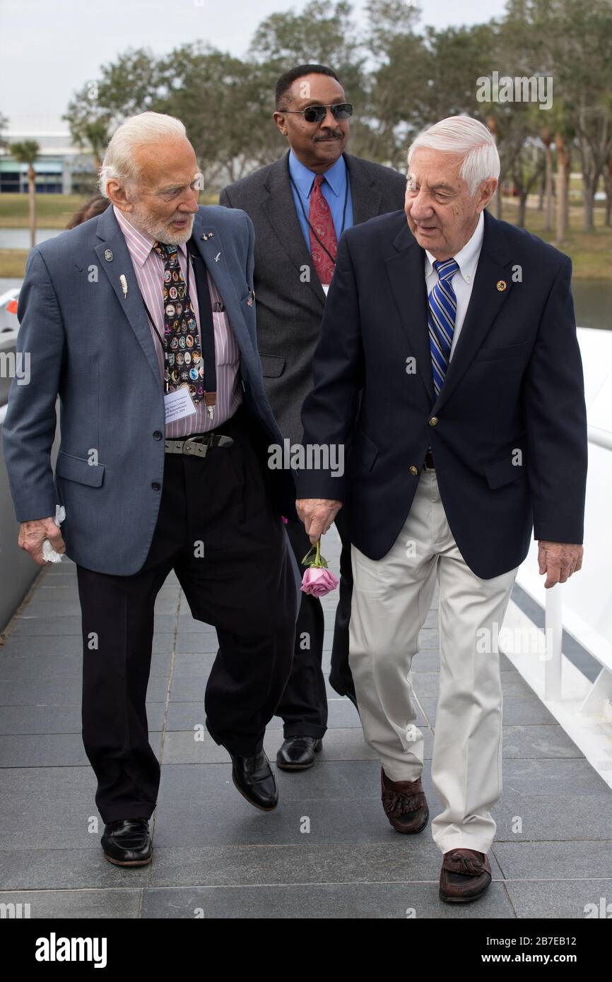 Former NASA astronauts Buzz Aldrin (left), Winston Scott, and Lowell Grissom, brother of NASA astronaut Gus Grissom, walk to the Kennedy Space Center Visitor Complex Space Mirror Memorial for the NASA Day of Remembrance ceremony January 25, 2018 in Merritt Island, Florida. Stock Photo