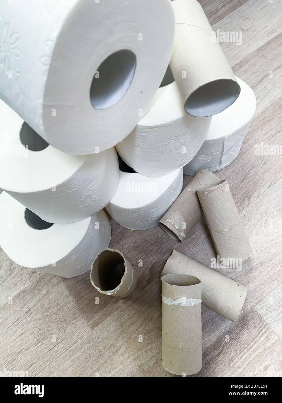 Stacks of empty and full white toilet paper rolls Stock Photo Alamy