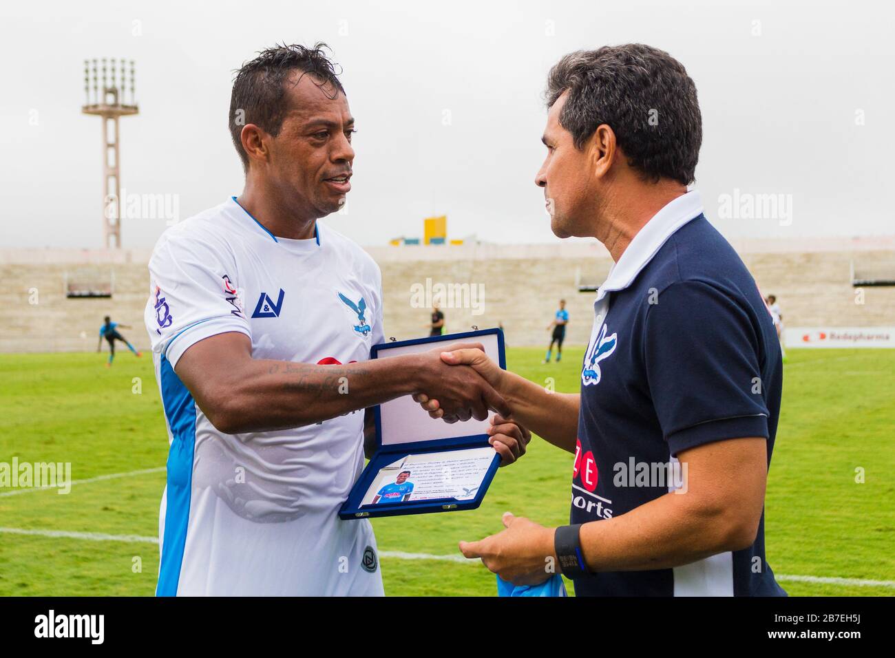 Campina Grande, Brazil. 15th Mar, 2020. Marcelinho Paraíba receives tribute  from coach Eudes Pedro after being replaced during a game between Perilima  and Centro Sportivo Paraibano (CSP), held this Sunday afternoon (15)