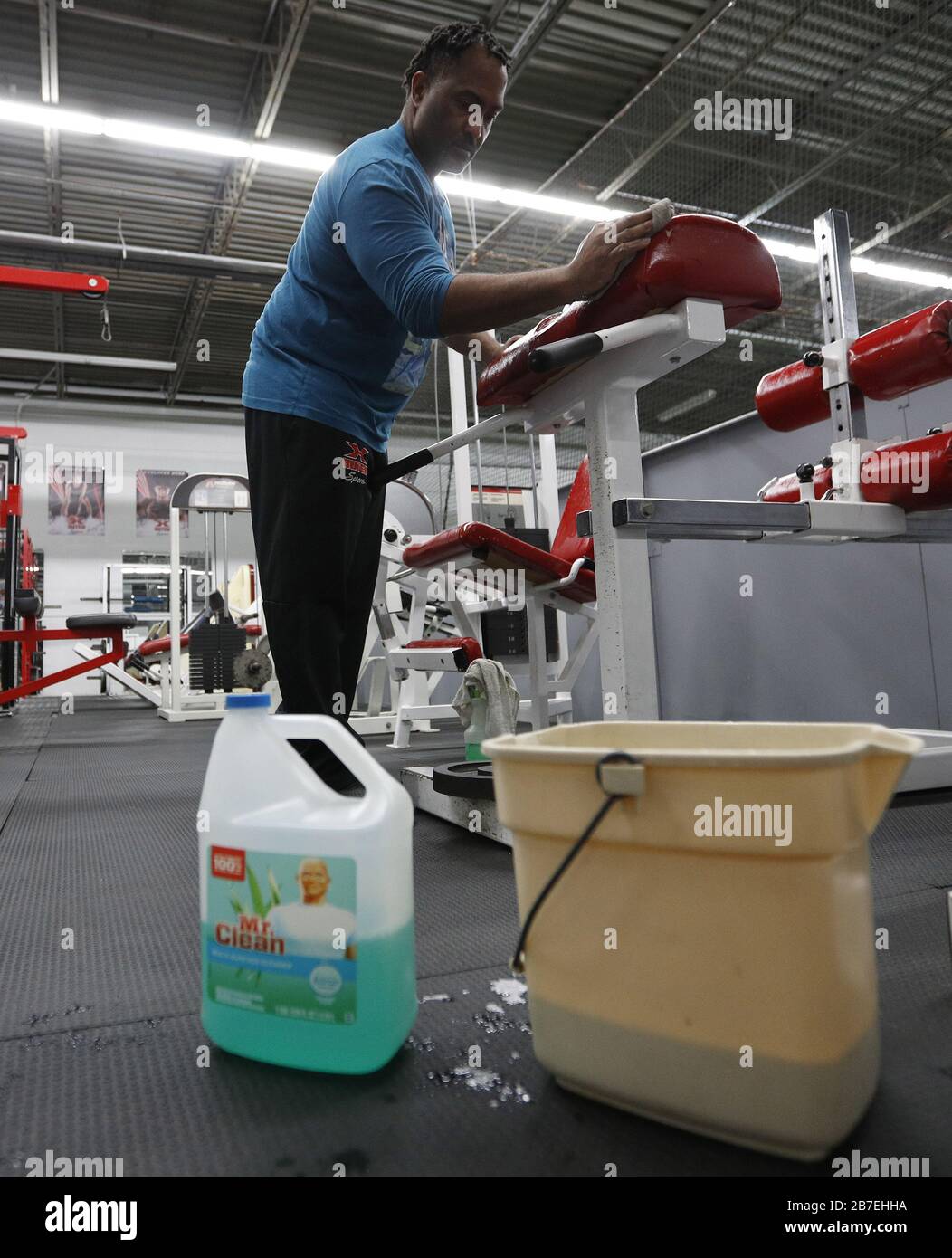 Medina, United States. 15th Mar, 2020. John Hutchings, owner of Hucth Academy training center, cleans his gym, after closing for the weekend to do an extensive cleaning in response to ongoing concerns of the Covid-19 virus, in Medina Ohio. Photo by Aaron Josefczyk/UPI Credit: UPI/Alamy Live News Stock Photo