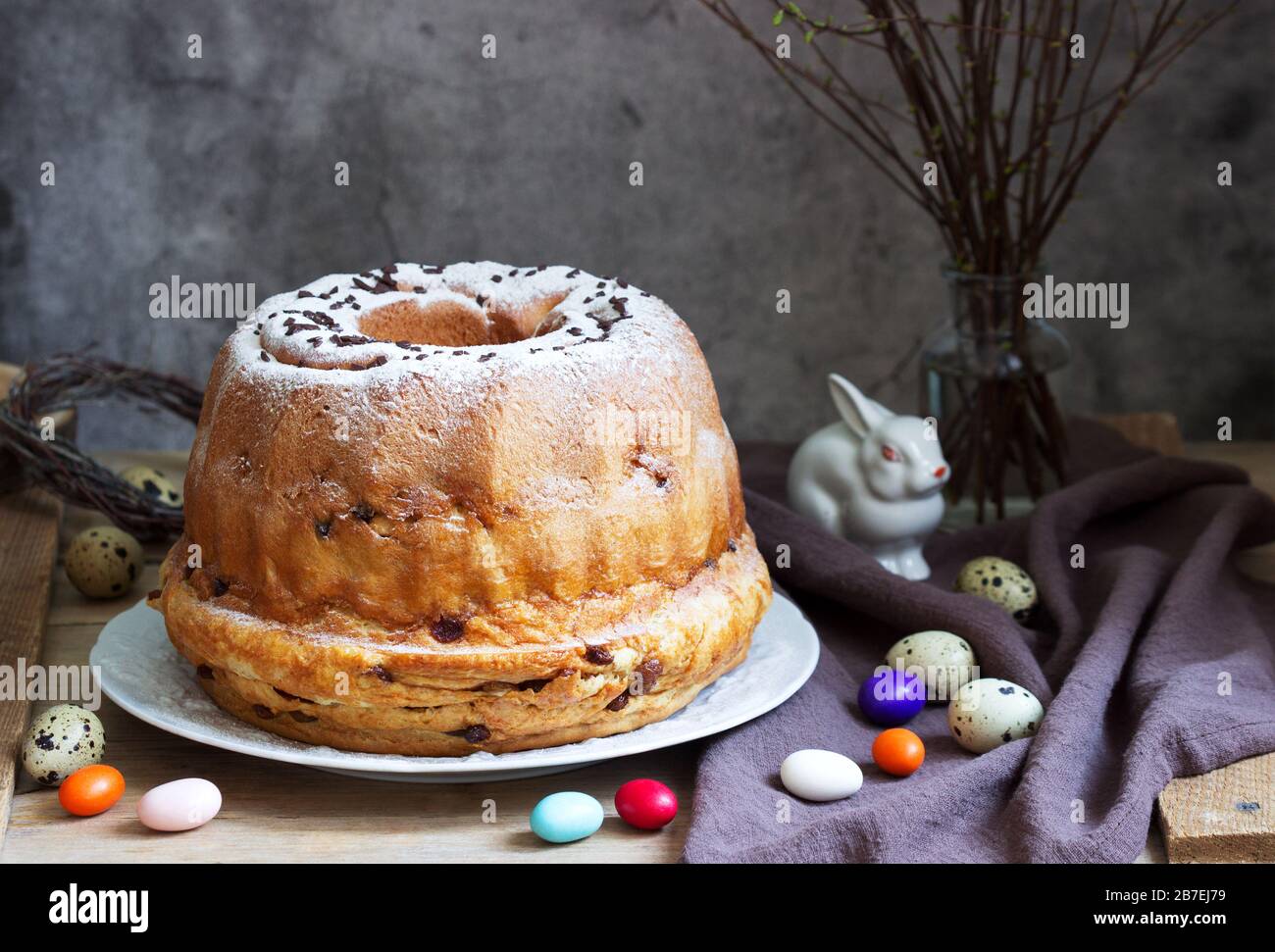 Reindling, german and austrian easter cake in easter decoration. Rustic style. Stock Photo