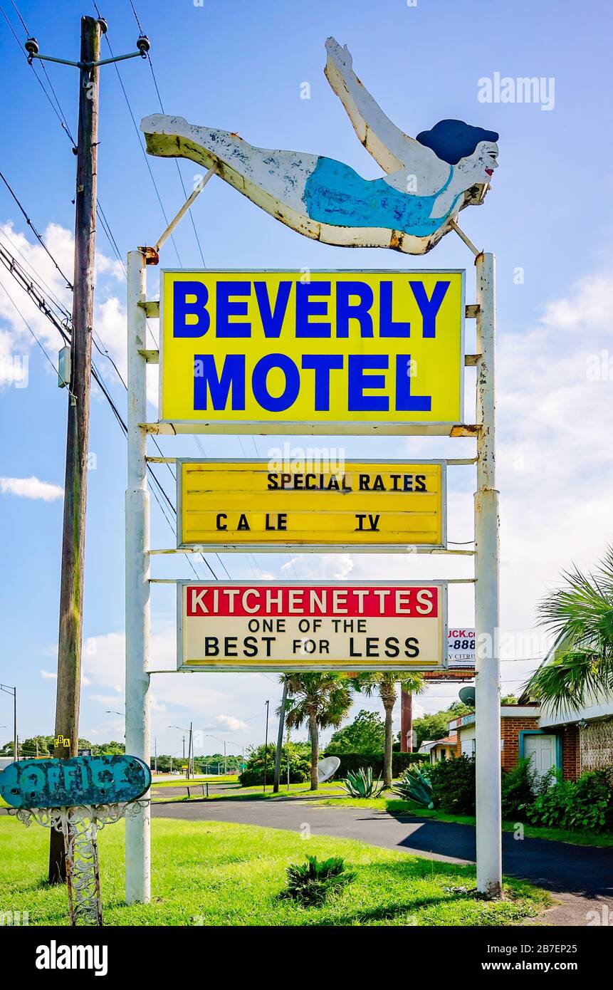 The Beverly Motel sign features a diving woman, July 30, 2016, in Mobile,  Alabama Stock Photo - Alamy
