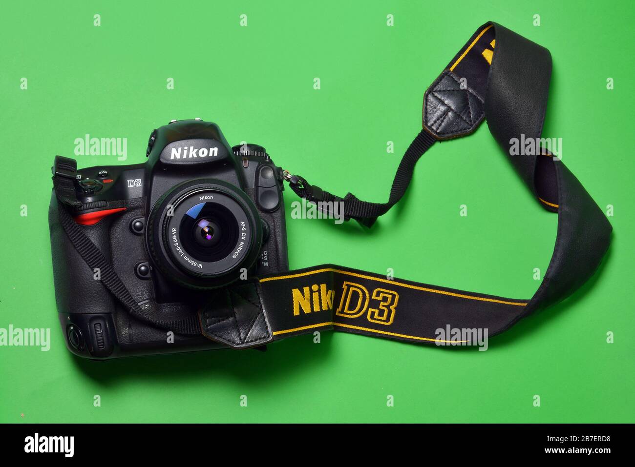 A greenscreen shot of a Nikon D3 DSLR camera, with strap. Stock Photo