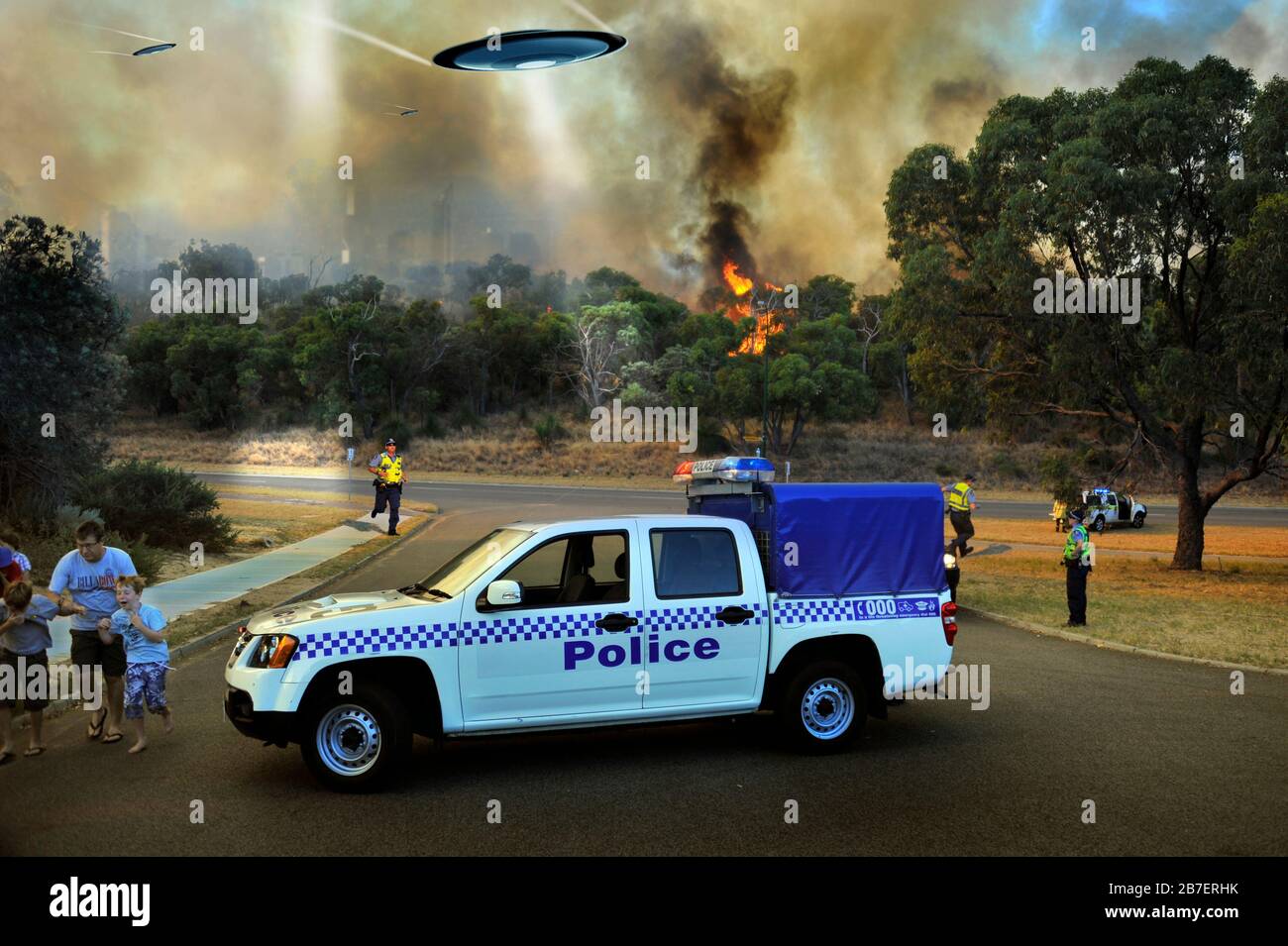 An urban environment under attack by a swarm of UFO's, with burning foliage, rays and people running. A police vehicle is in centre of frame. Stock Photo