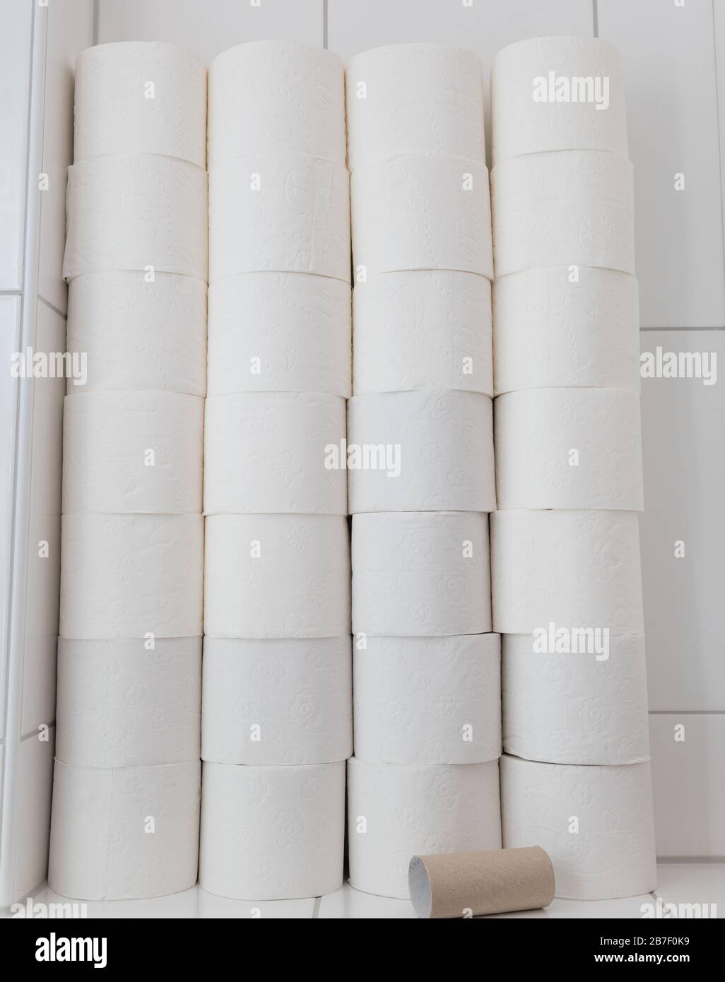 Closeup of white rolls of toilet paper in a bathroom Stock Photo