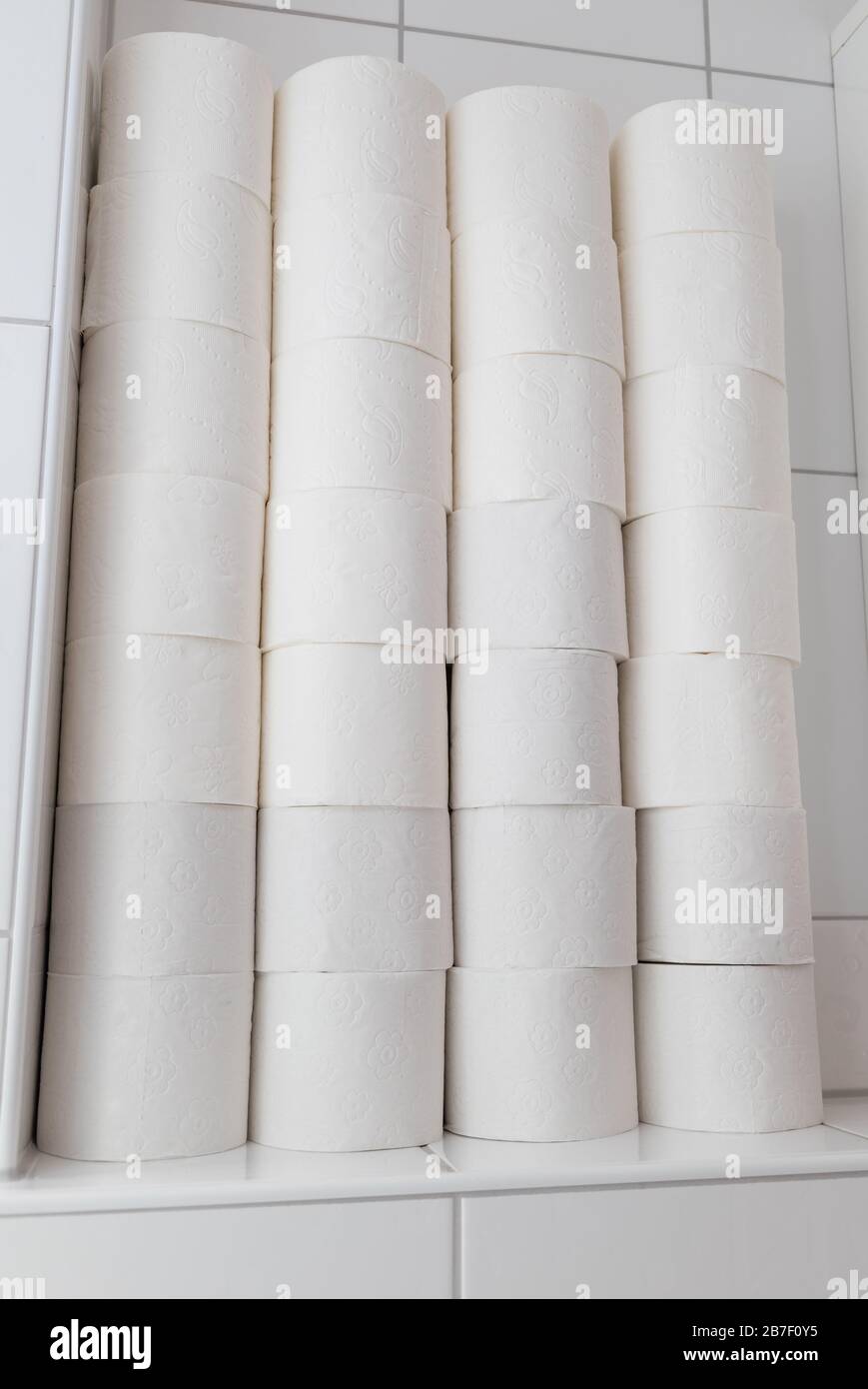 Closeup of white rolls of toilet paper in a bathroom Stock Photo