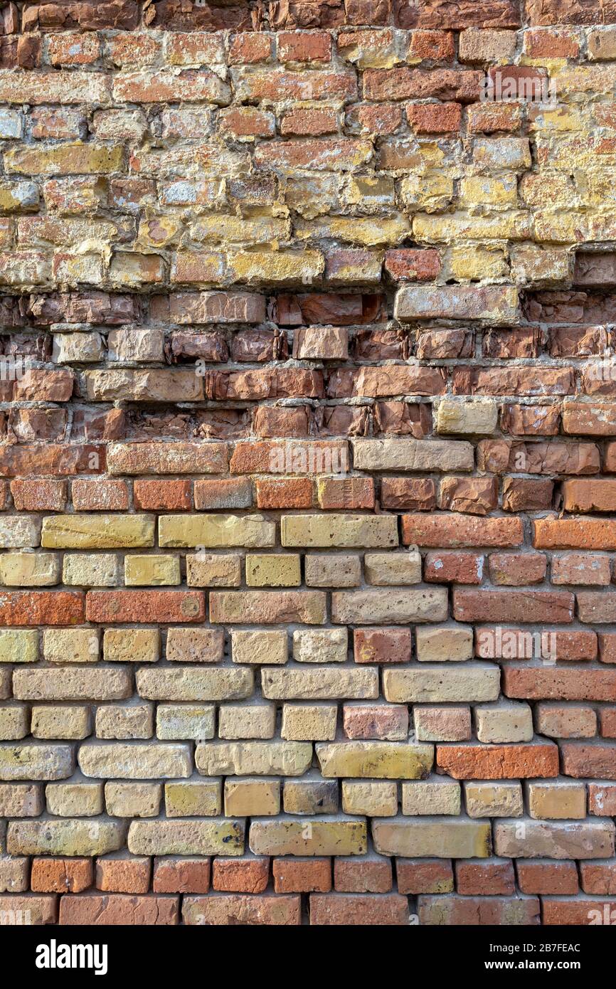 Closeup texture of the old red brick wall. Abstract closeup brick