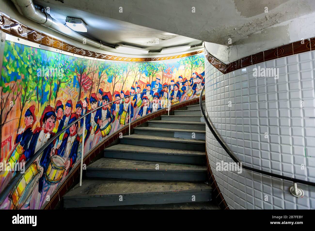 Colorful mural depicting soldiers, along the stairs in Abbesses Metro station, Montmartre, Right Bank, Paris, France, Europe, color Stock Photo