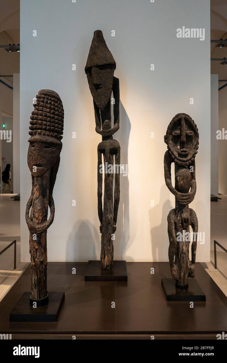 Wooden african sculptures on display at the Louvre Museum in Paris, France, Europe Stock Photo