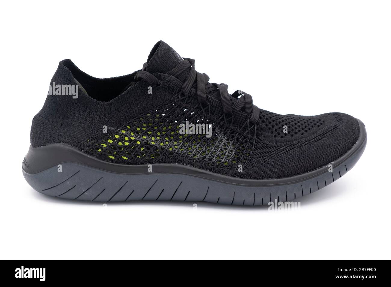 Black Free RN Flyknit ventilated summer sneaker isolated on white background Stock Photo