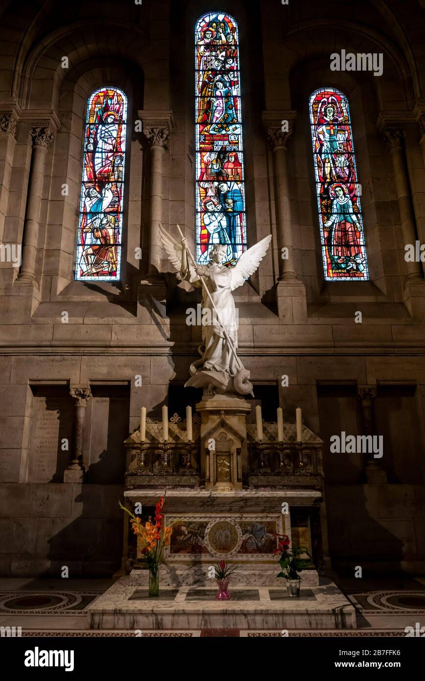 Statue of Saint Michael inside the Sacre Coeur Basilica in Paris, France, Europe Stock Photo