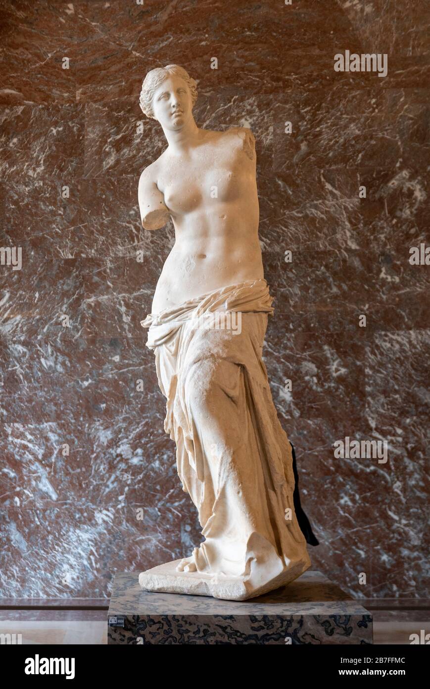 The Venus de Milo ancient greek marble statue by artist Alexandros of Antioch, dating from around 130-100 BC, at the Louvre Museum, Paris, France Stock Photo