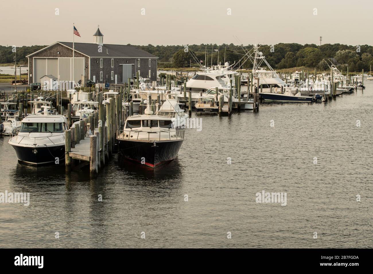 There's plenty of boatyards in Osterville. This one (no name) is at the drawbridge at Oyster Harbor. Small town busy location on lower Cape Cod. Stock Photo