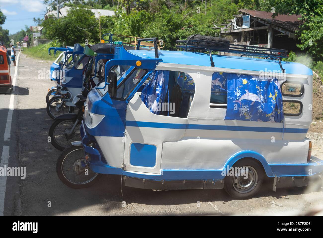 Traditional small tricycle public transportation vehicles used in the