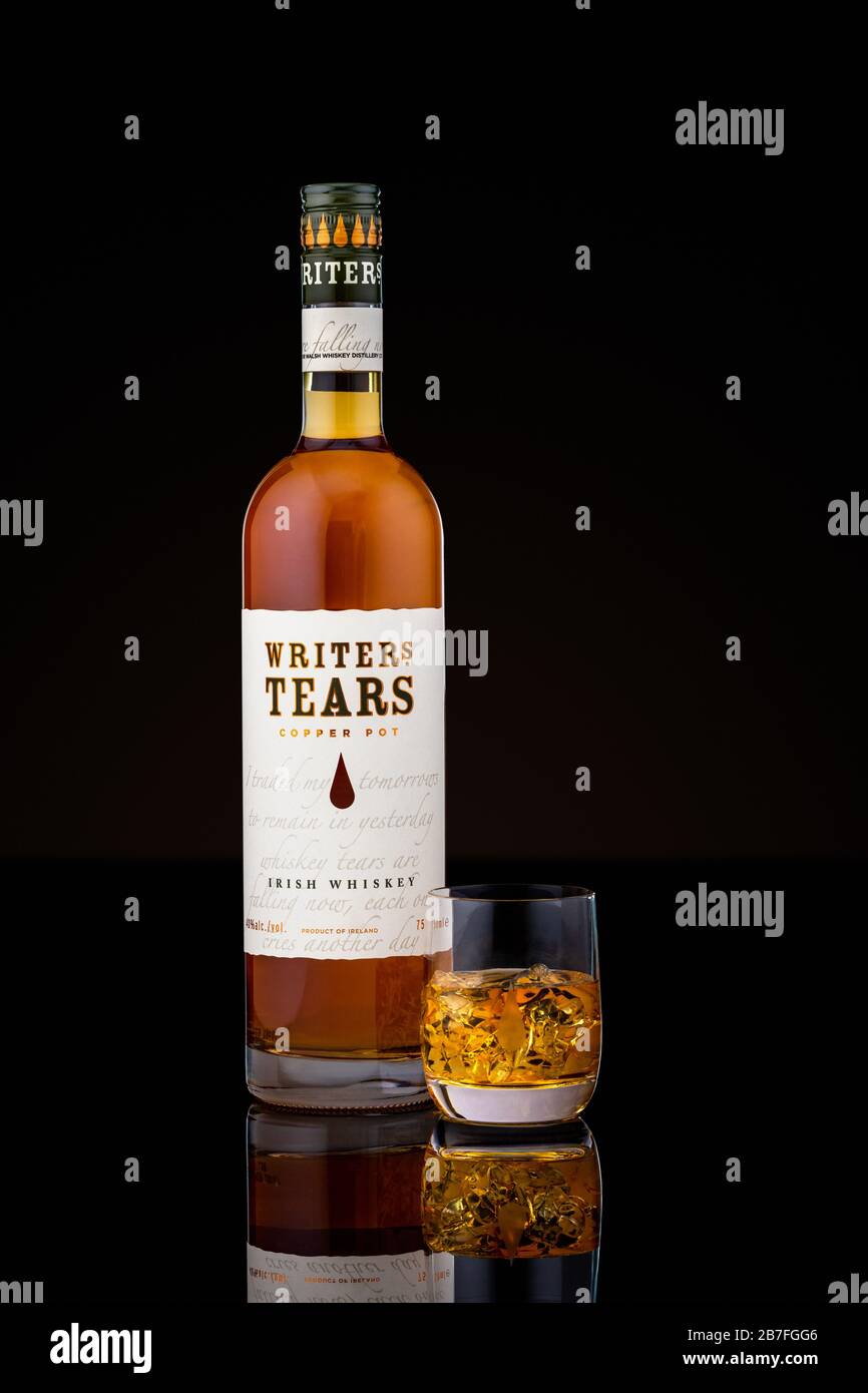 Bottle and glass of Writers Tears Irish whiskey. Stock Photo