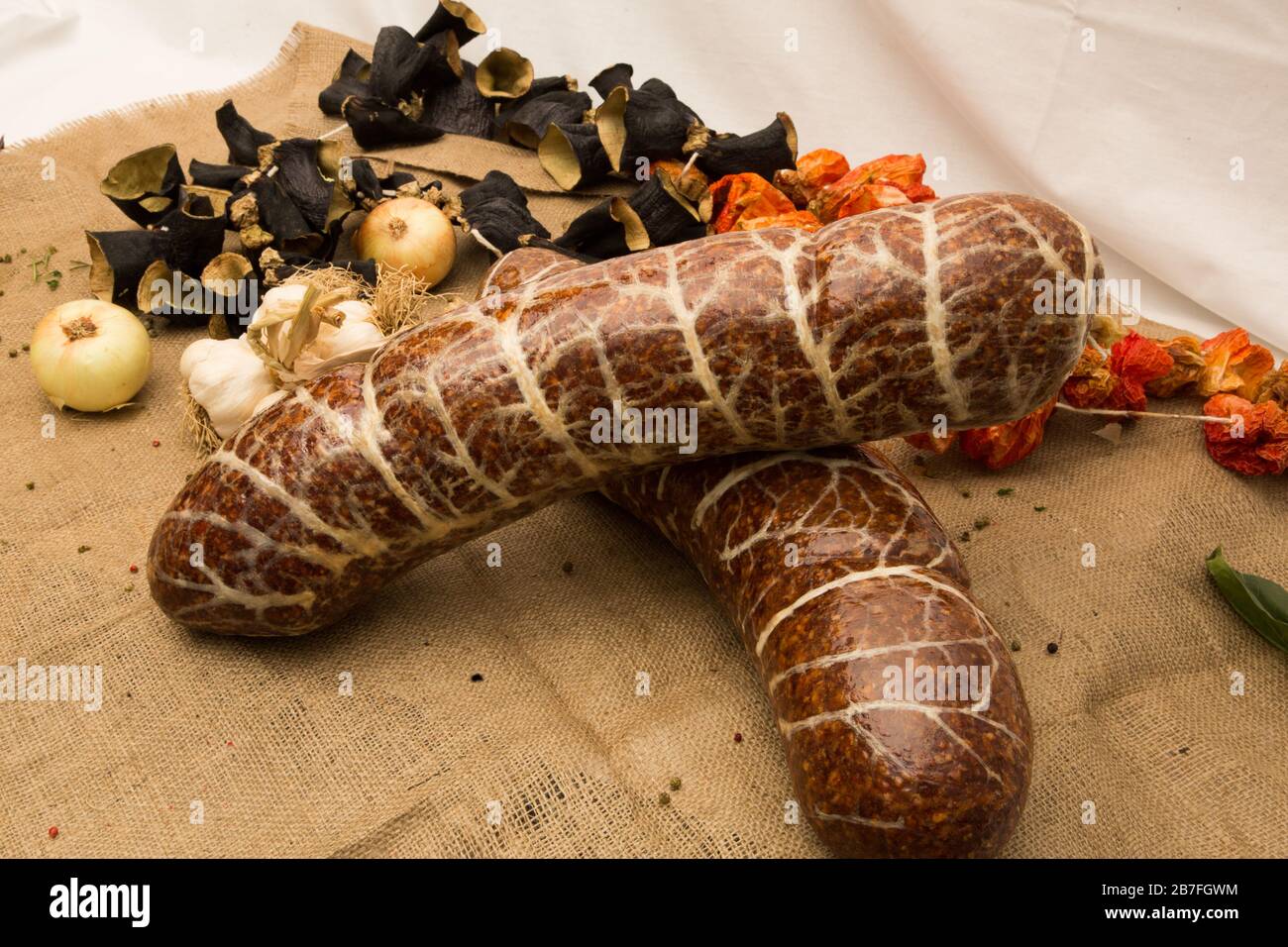 Sugiuc Turkish sausage golden sucuk. Sujuk (sucuk), a dry spicy sausage on ...