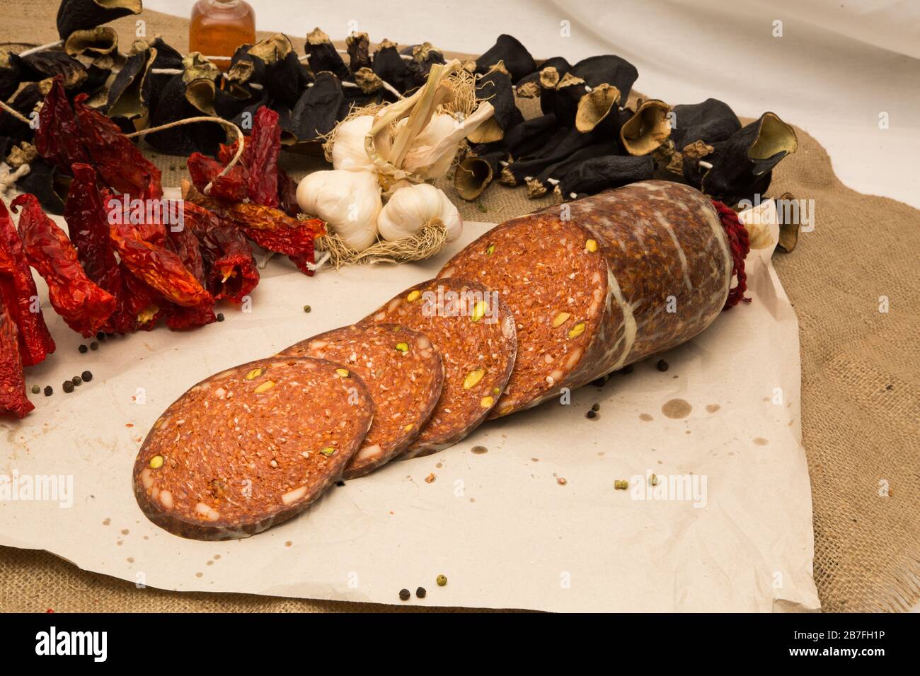 Sugiuc Turkish sausage golden sucuk. Sujuk (sucuk), a dry spicy sausage on ...