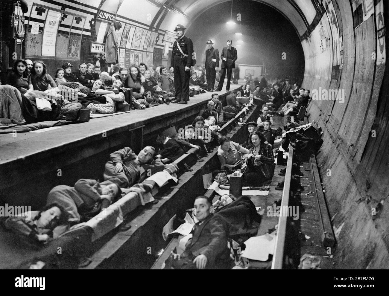 The scene at Aldwych tube station 1940. Seventy nine tube stations were used as air raid shelters by Londoners, but they were not proof against a direct hit. Stock Photo