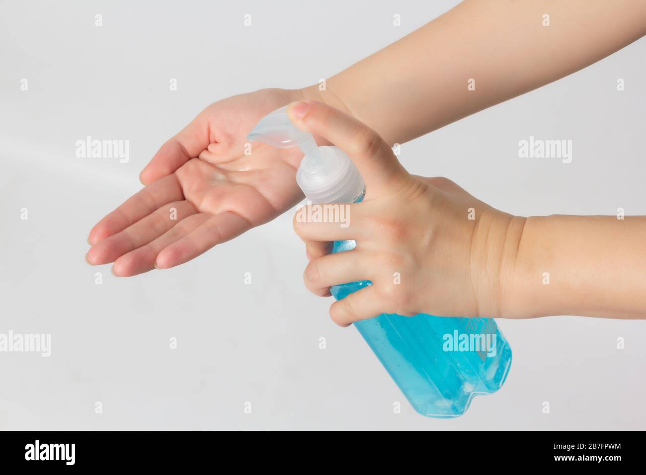 Woman using alcohol antiseptic gel for cleaning hands on white ...