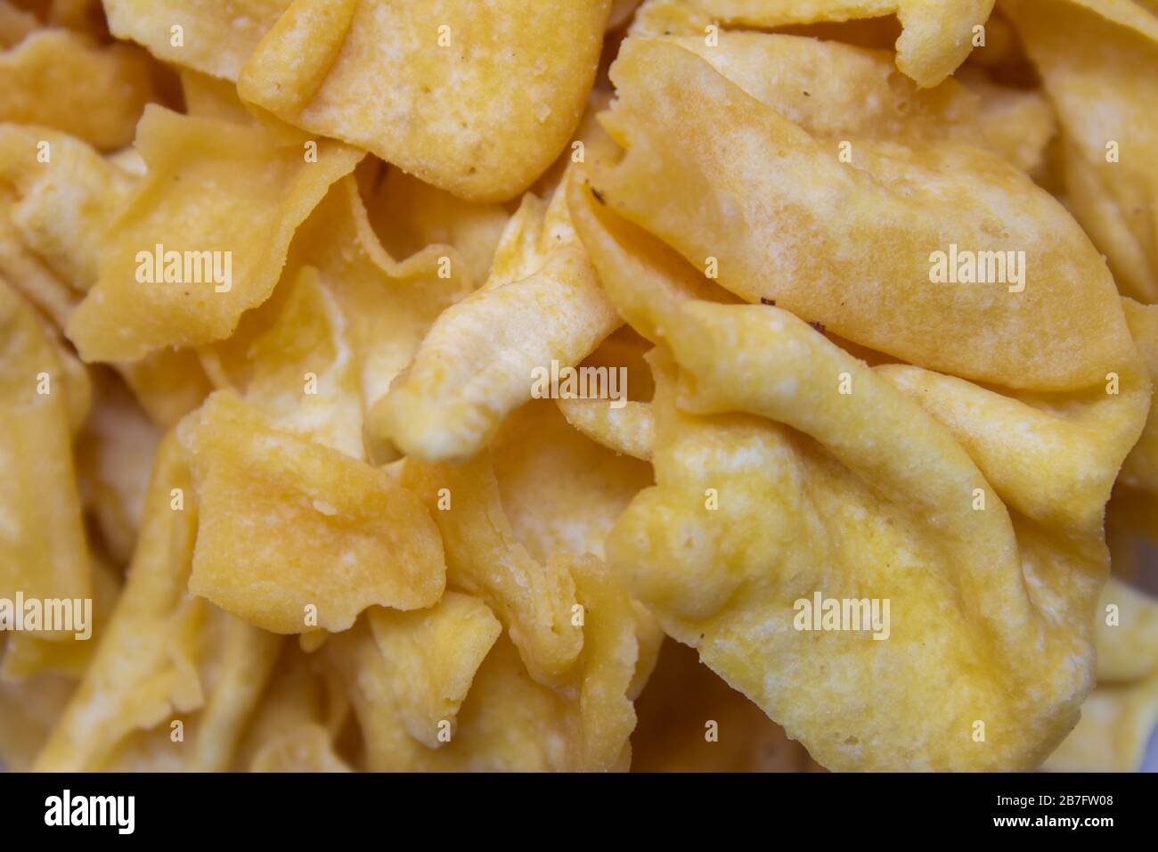 Close view of papdi gathiya which is a popular indian savoury. Indian sweet and savoury prepared during festivals. Stock Photo