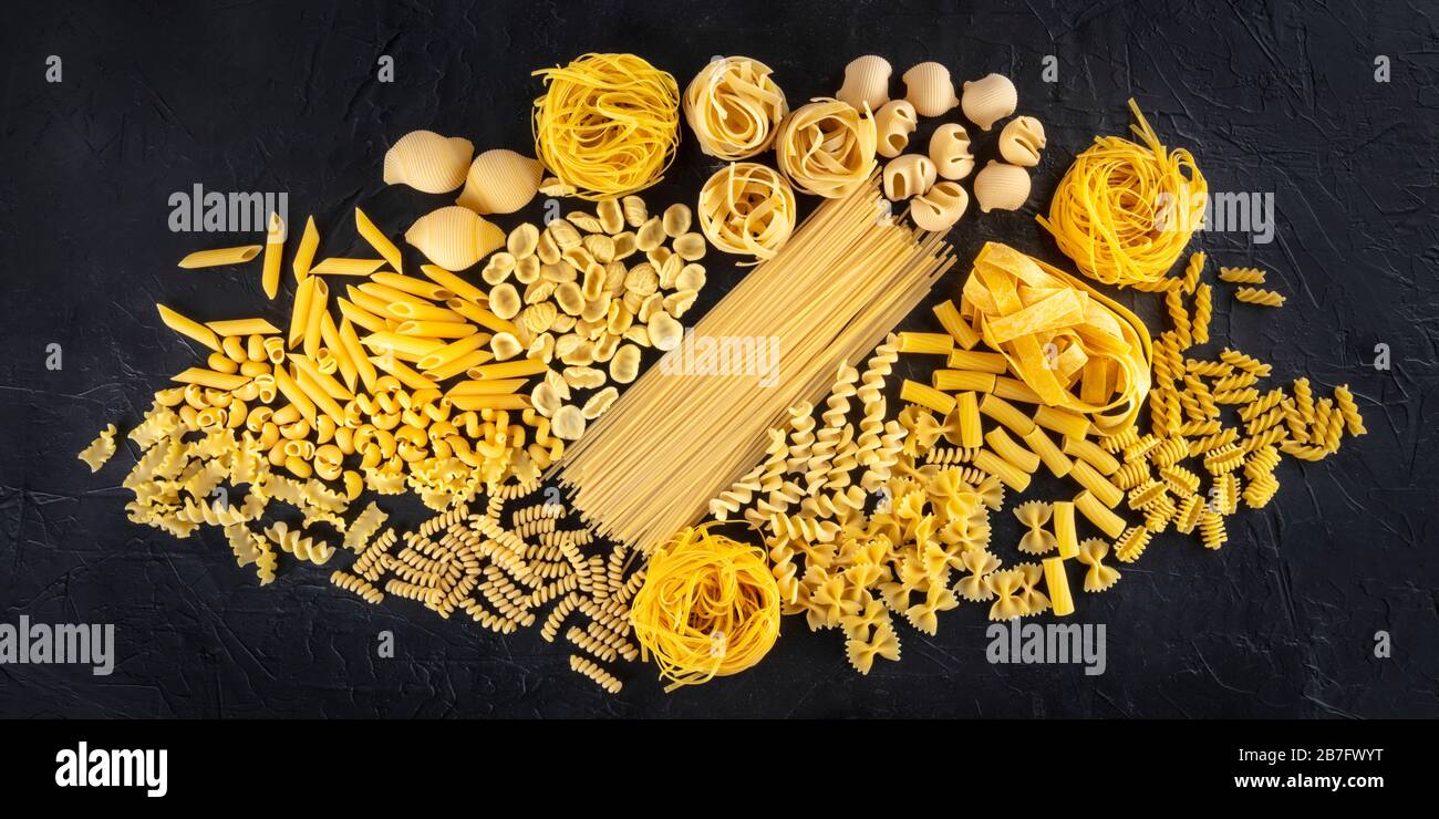 Italian pasta panorama, a top shot of various pasta types on a black