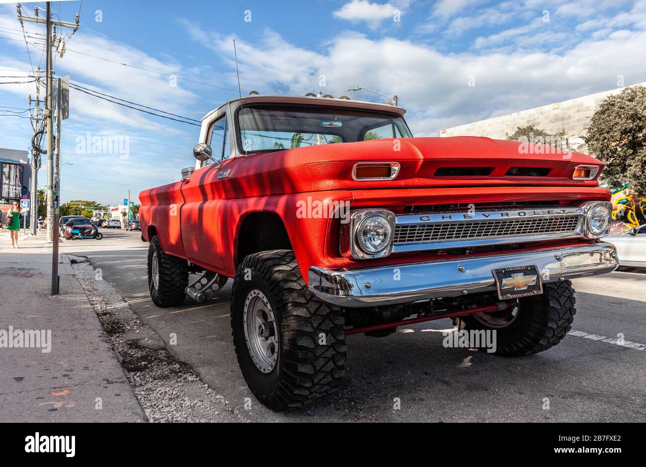 Three quarter front view of an old Chevrolet pickup truck parked on the side of a road, Wynwood neighborhood, Miami, Florida, USA. Stock Photo