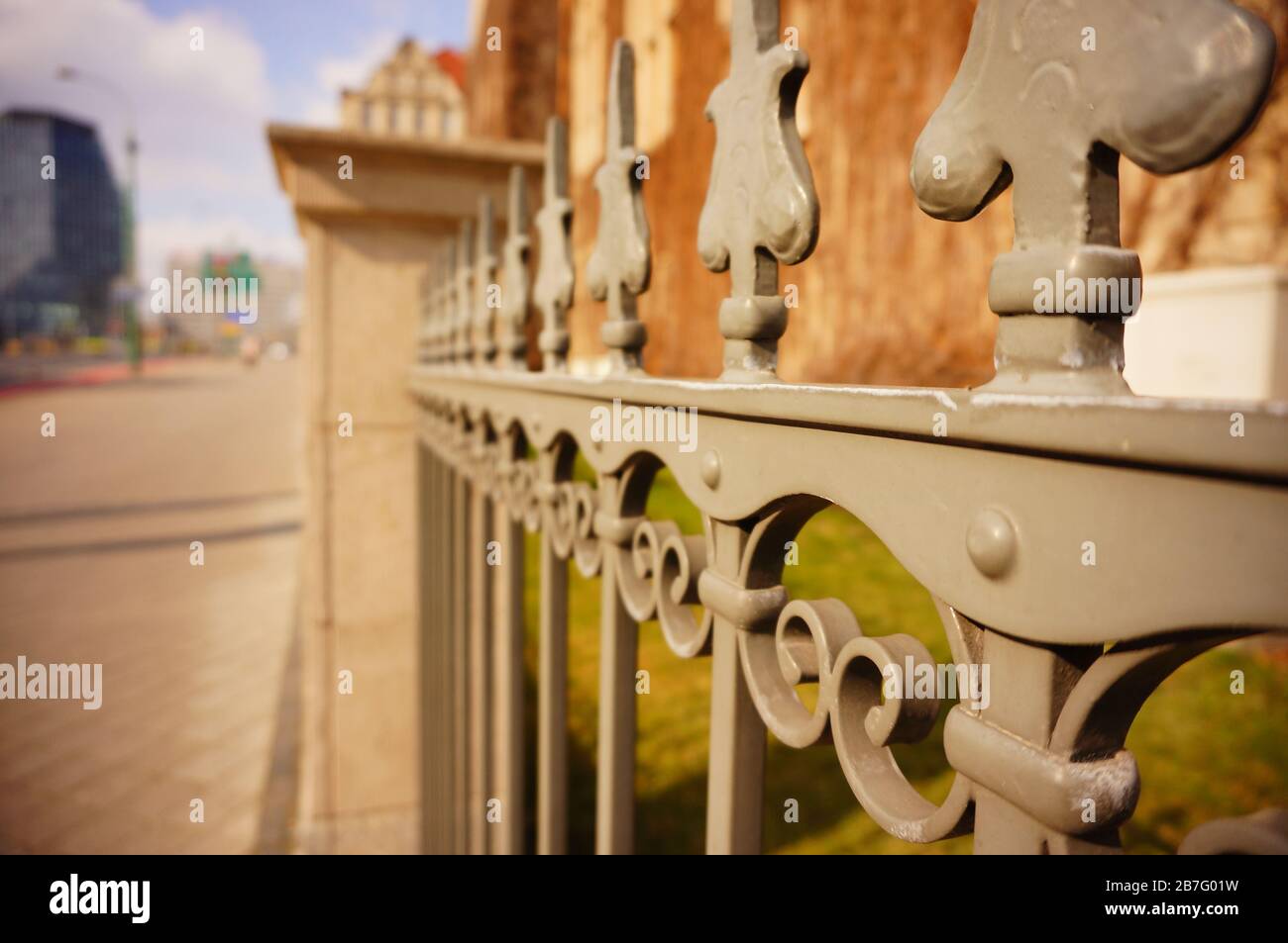 Closeup shot f a metal fence with blurred background Stock Photo - Alamy