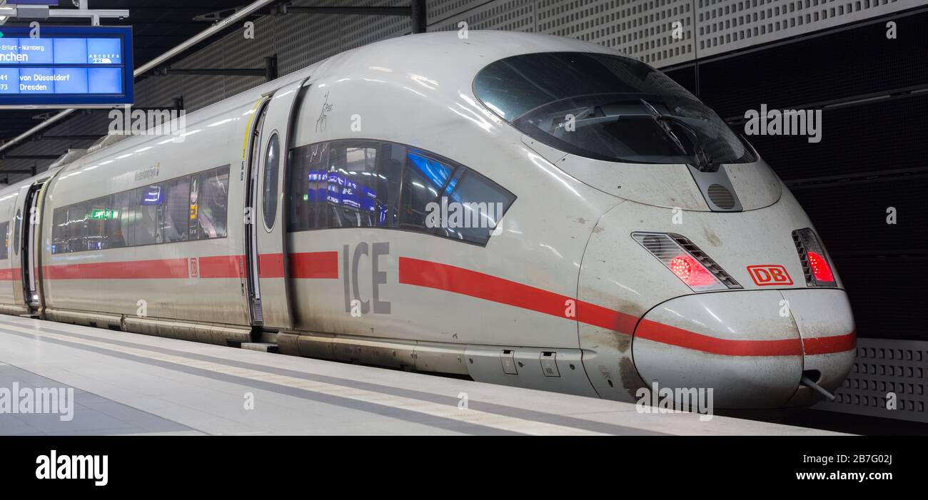 High resolution panorama / front view of an Intercity City Express (ICE) train of Deutsche Bahn (DB). Standing at a platform at Berlin Central Station Stock Photo