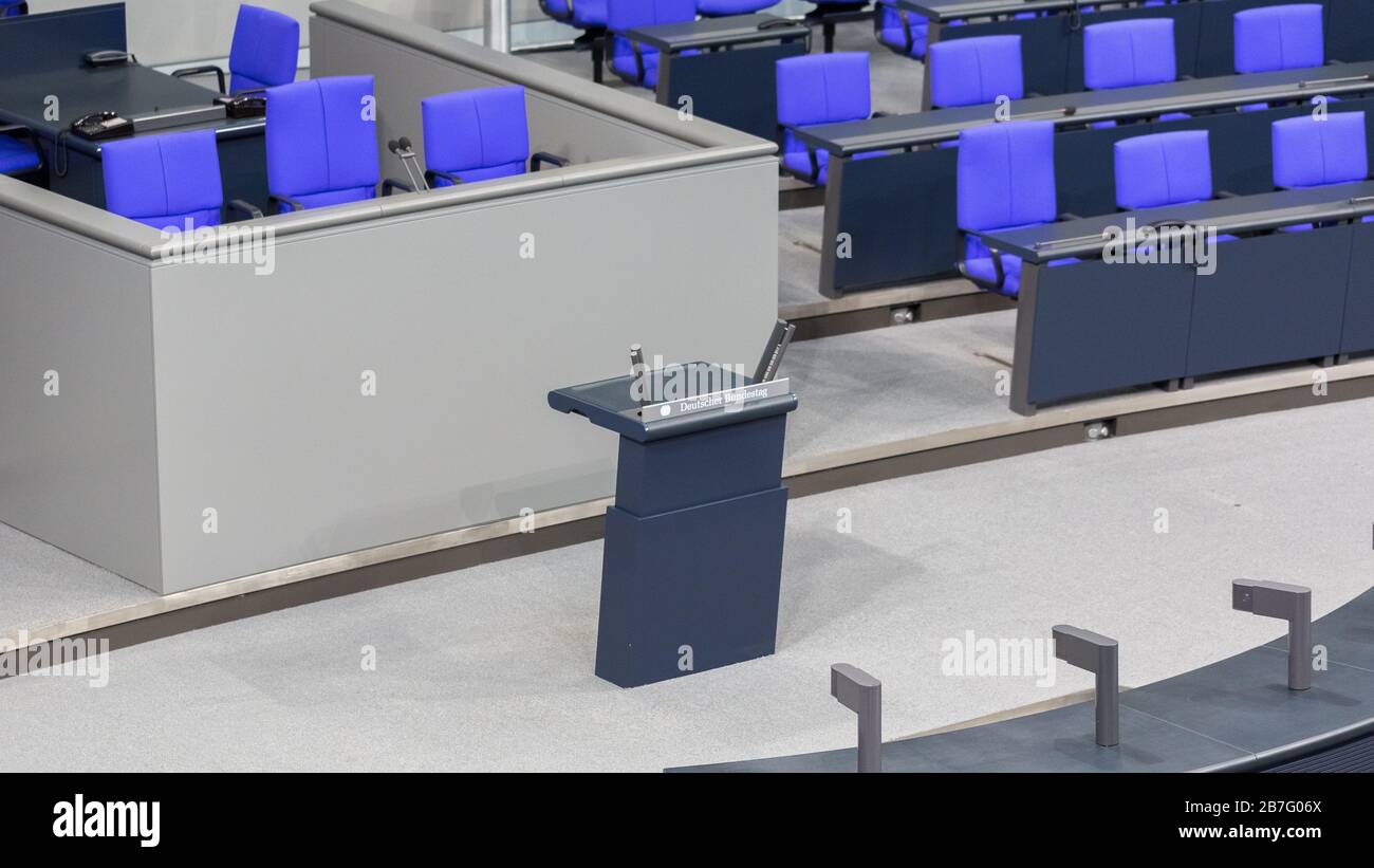 View on lectern (Rednerpult) with writing 'Deutscher Bundestag'. All sessions of the German Federal Parliament are public. Stock Photo