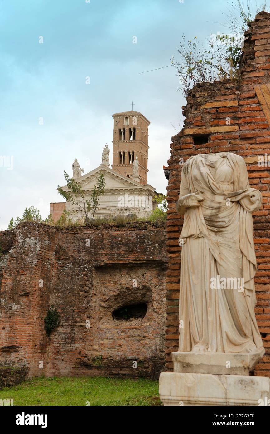 Statue At Temple Of Vesta And The House Of The Vestal Virgin In Roman