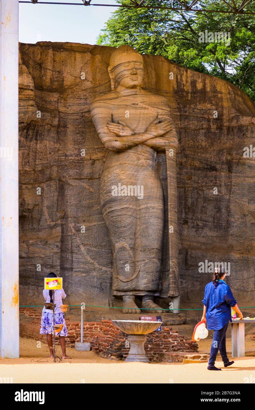Sri Lanka Ceylon Cultural Triangle Anuradhapura Polonnaruwa Gal Vihara   Buddhist shrine single piece granite statue sculpture standing Buddha Stock Photo