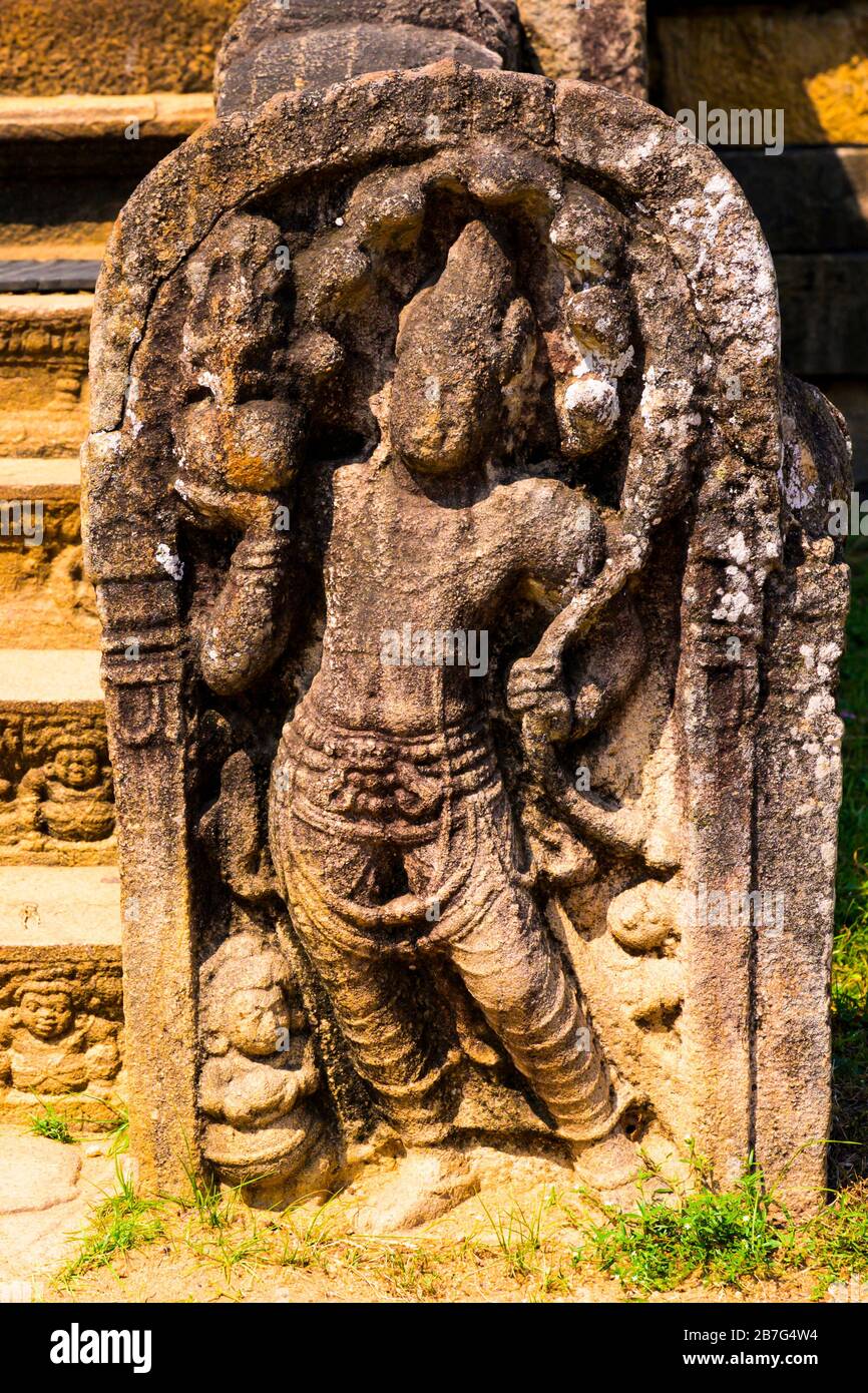 Sri Lanka Anuradhapura Isurumuni Rock Temple Monastery 3 BC built King Devanampiya Tissa sacred shrine stone carving sculpture guard stone figure Stock Photo